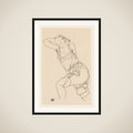 Reclining Model in Chemise and Stockings framed