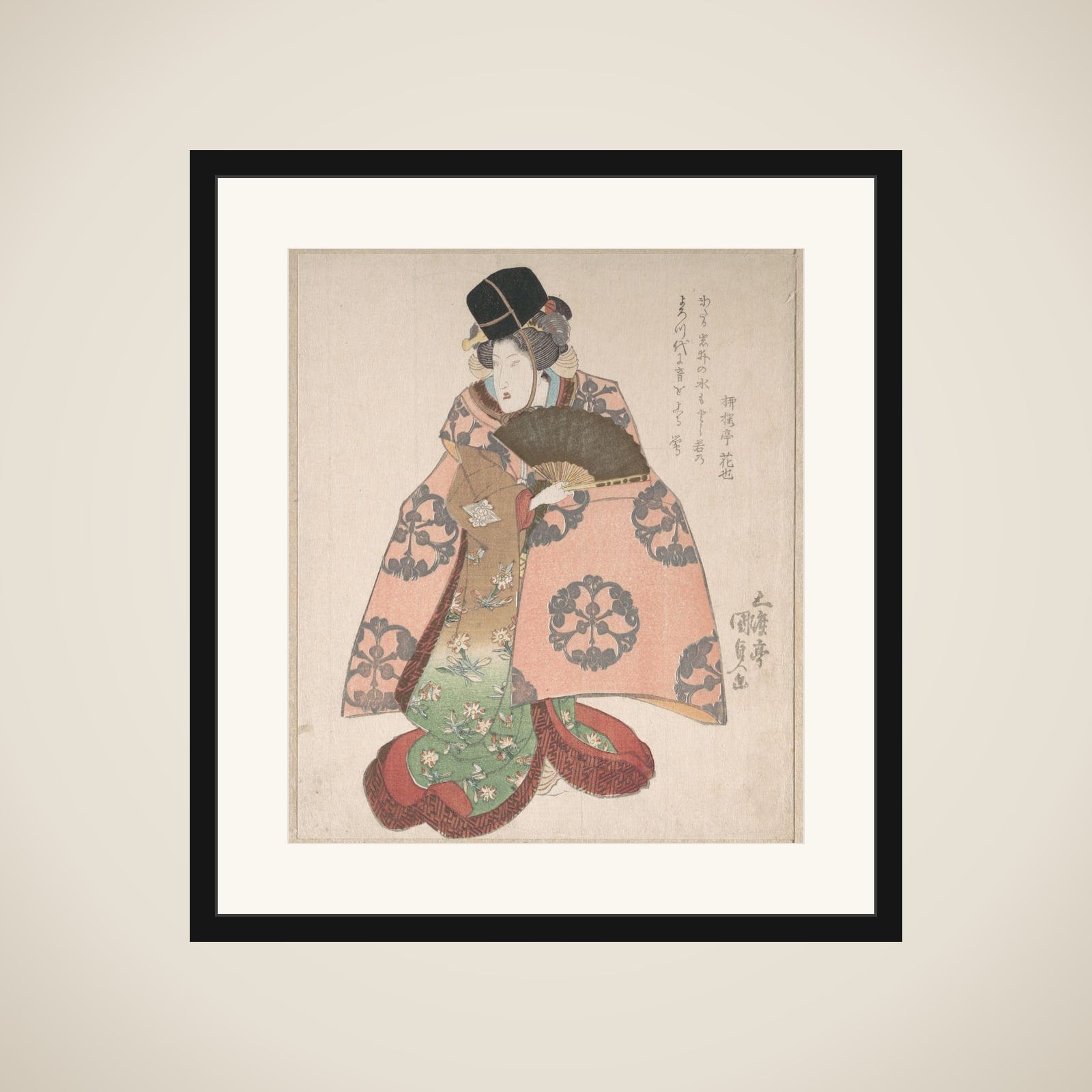 Kabuki Actor in a Female Role Standing with a Fan framed
