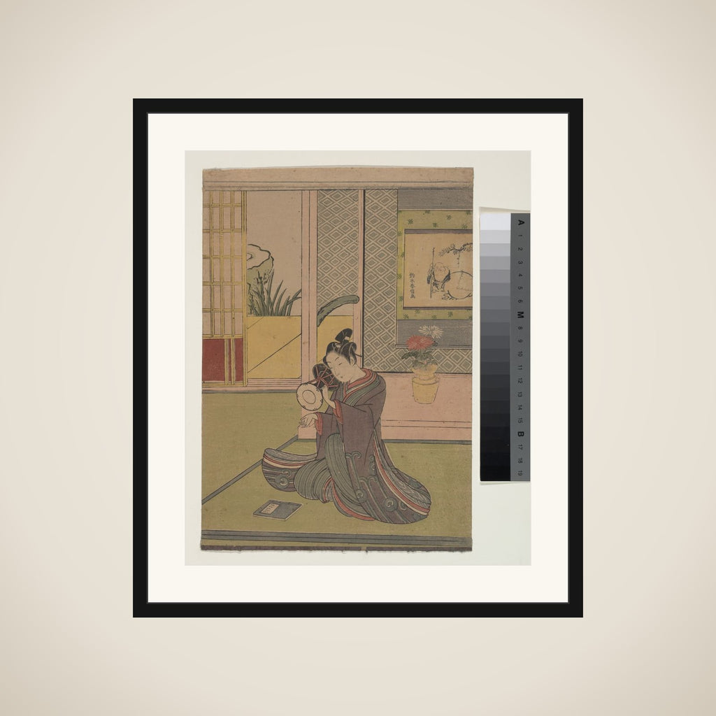 Young Man Playing a Noh Drum framed