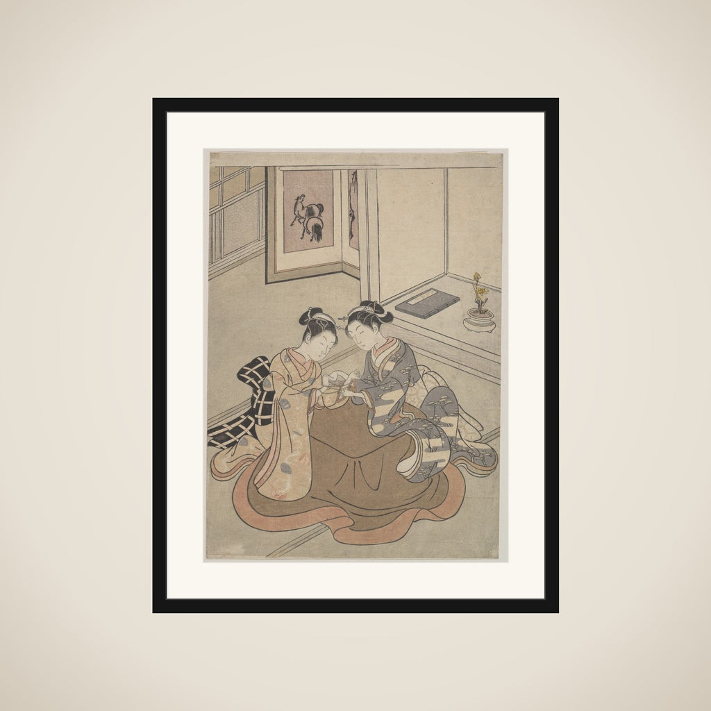Two Young Women Seated by a Kotatsu Playing Cat's Cradle framed