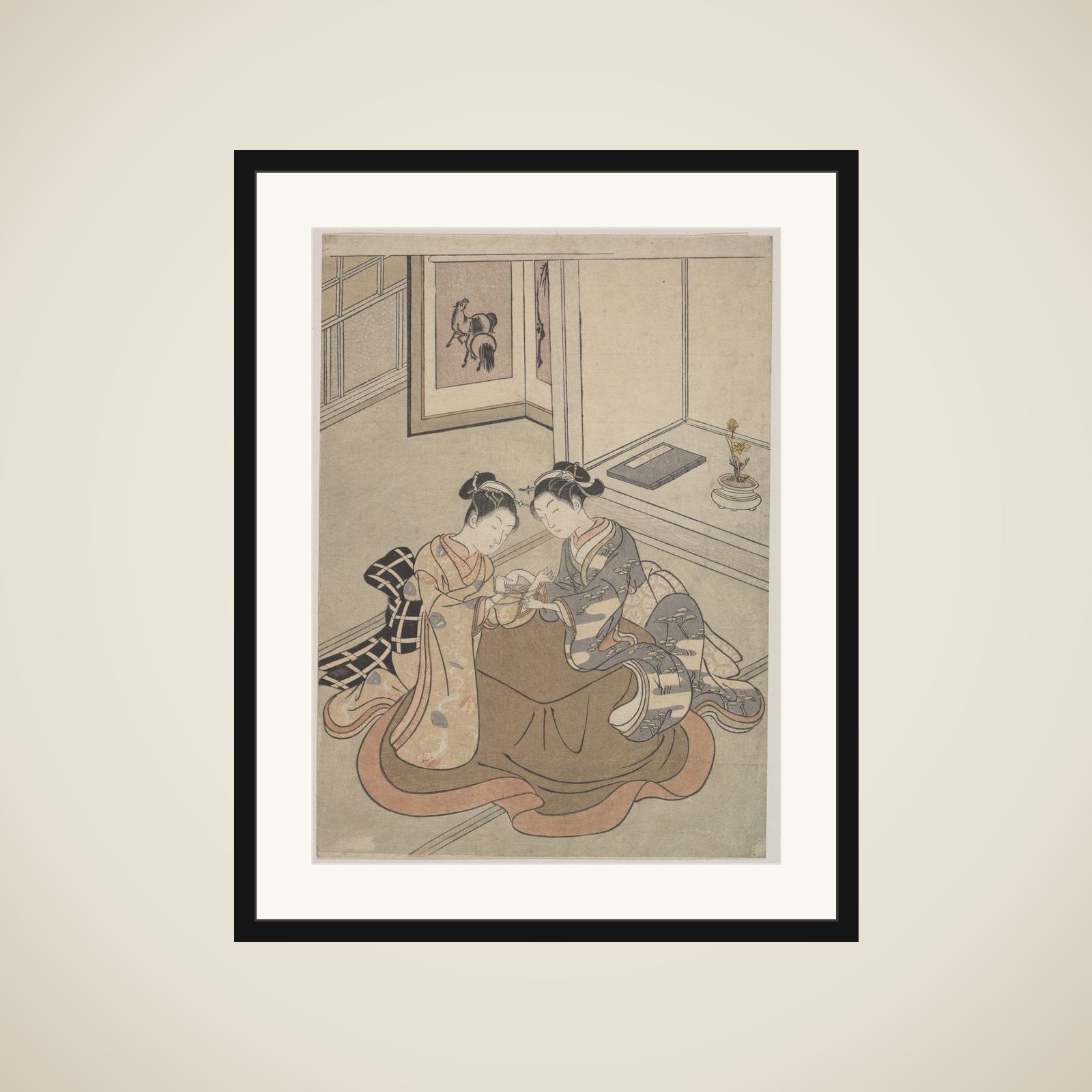 Two Young Women Seated by a Kotatsu Playing Cat's Cradle framed