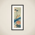 A Black-Naped Oriole on a Stem of Rose Mallow framed