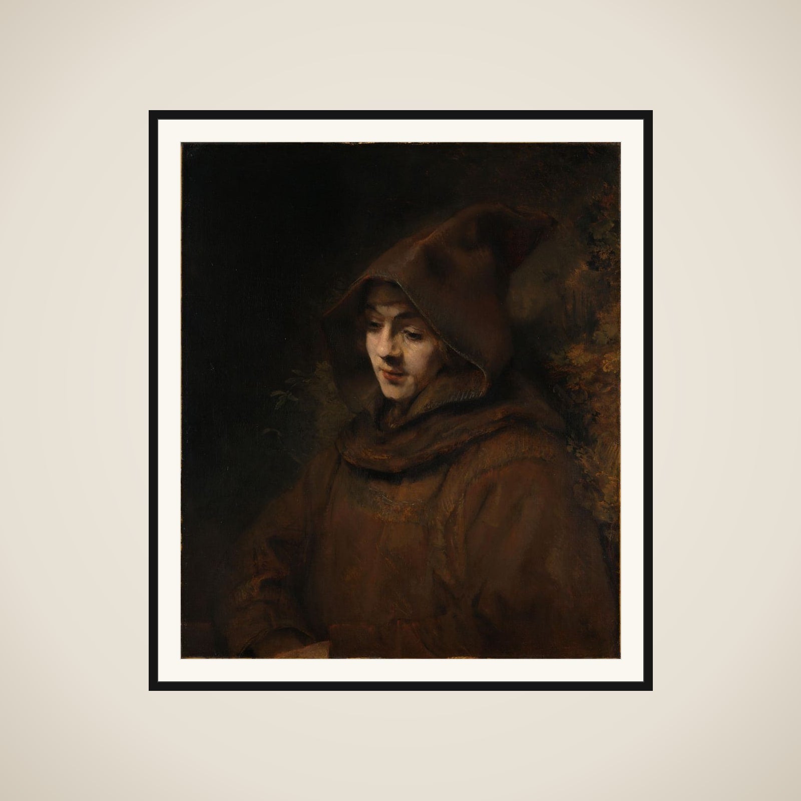Rembrandt's son in a monk's habit, possibly in the guise of St Francis of Assisi framed