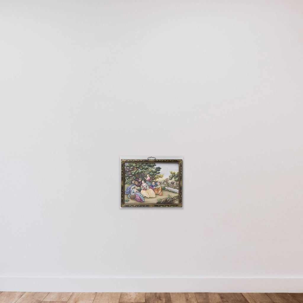Two plaques depicting European fêtes champêtres unframed — shown to scale
