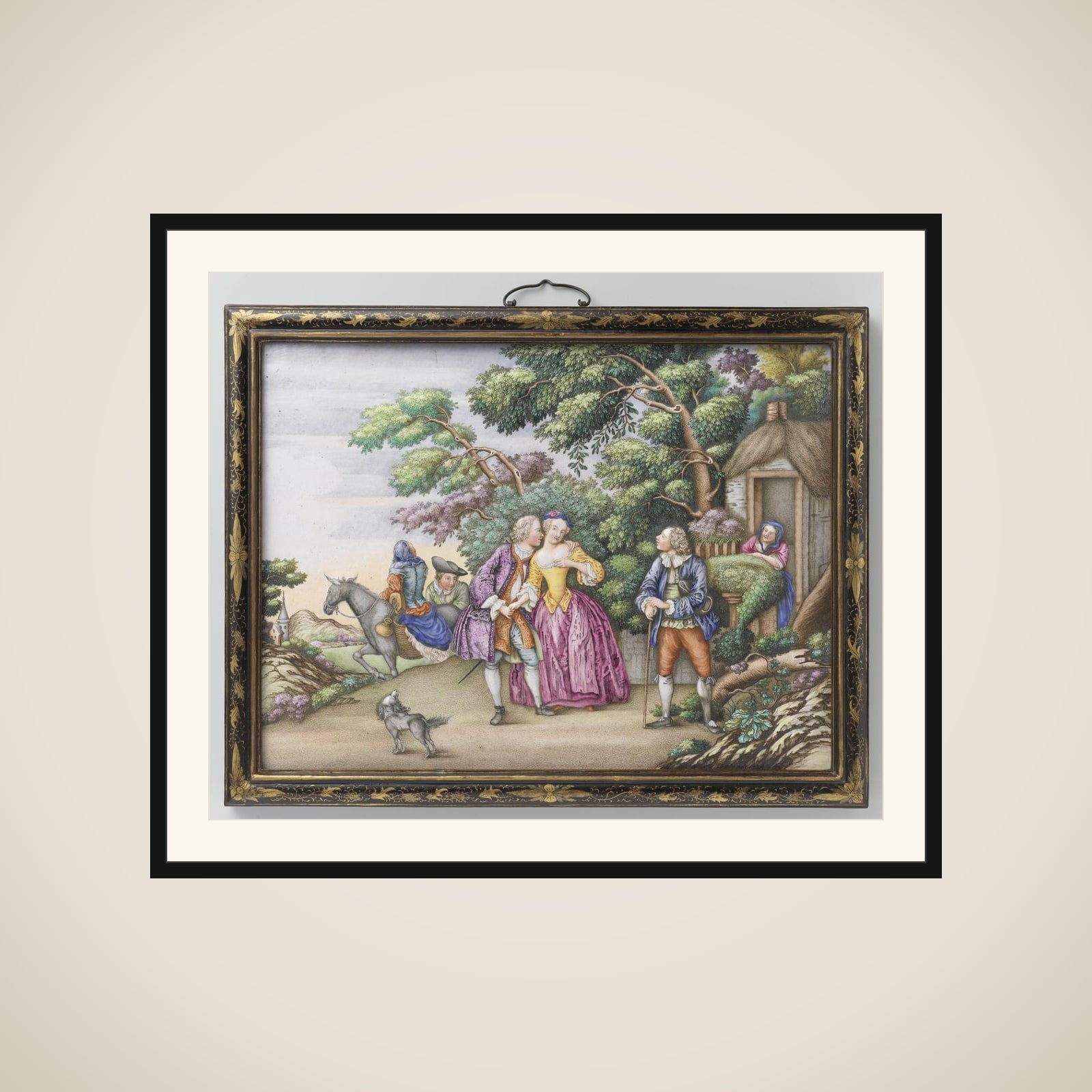 Two plaques depicting European fêtes champêtres framed