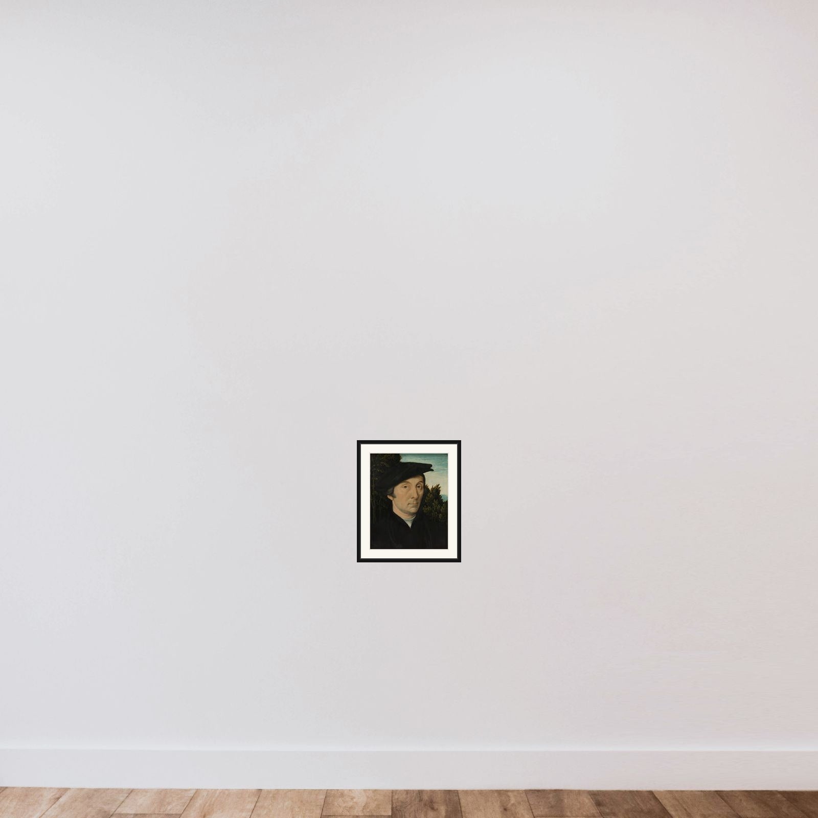 Portrait of a man framed — shown to scale