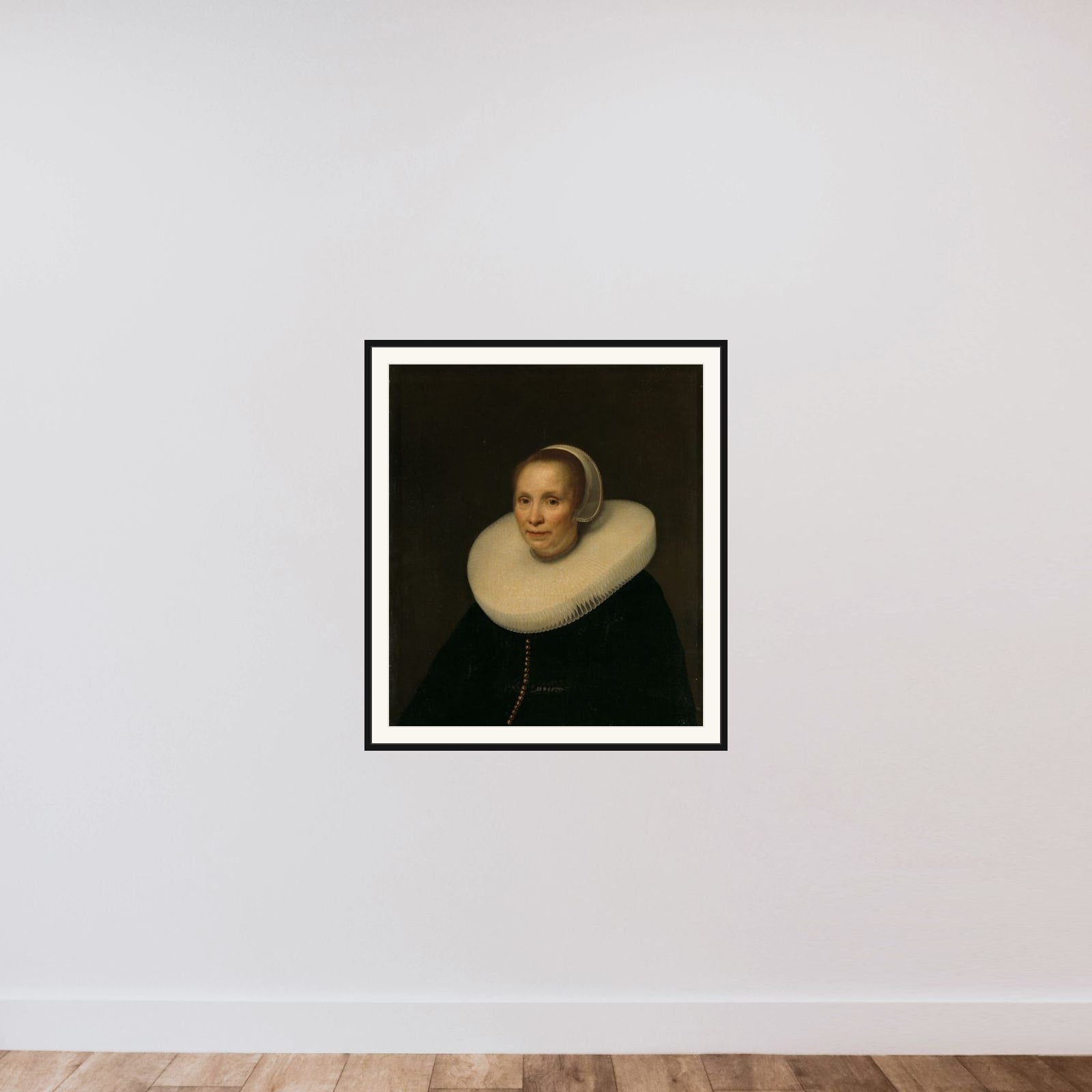 Portrait of a woman framed — shown to scale