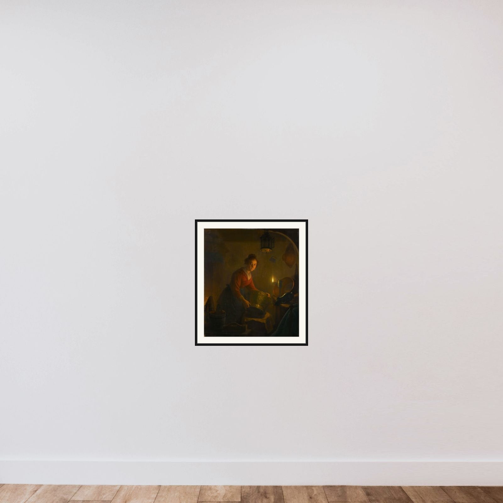 A Woman in a Kitchen by Candlelight framed — shown to scale