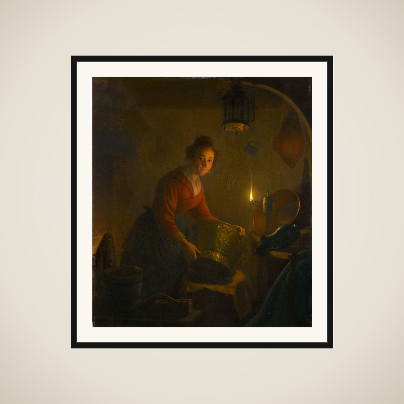 A Woman in a Kitchen by Candlelight framed