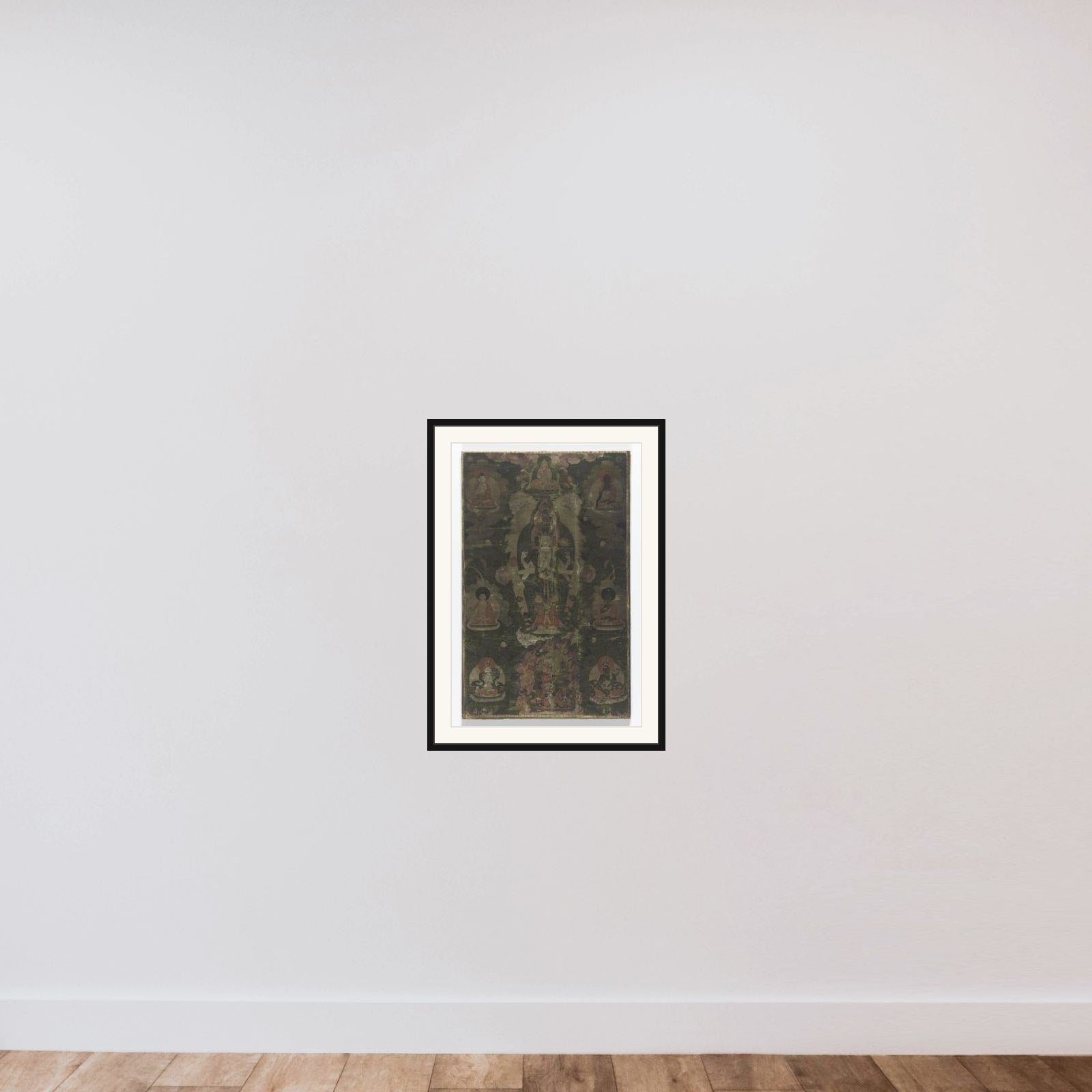 Tangka met een voorstelling van de Elfhoofdige Avalokiteshvara. framed — shown to scale