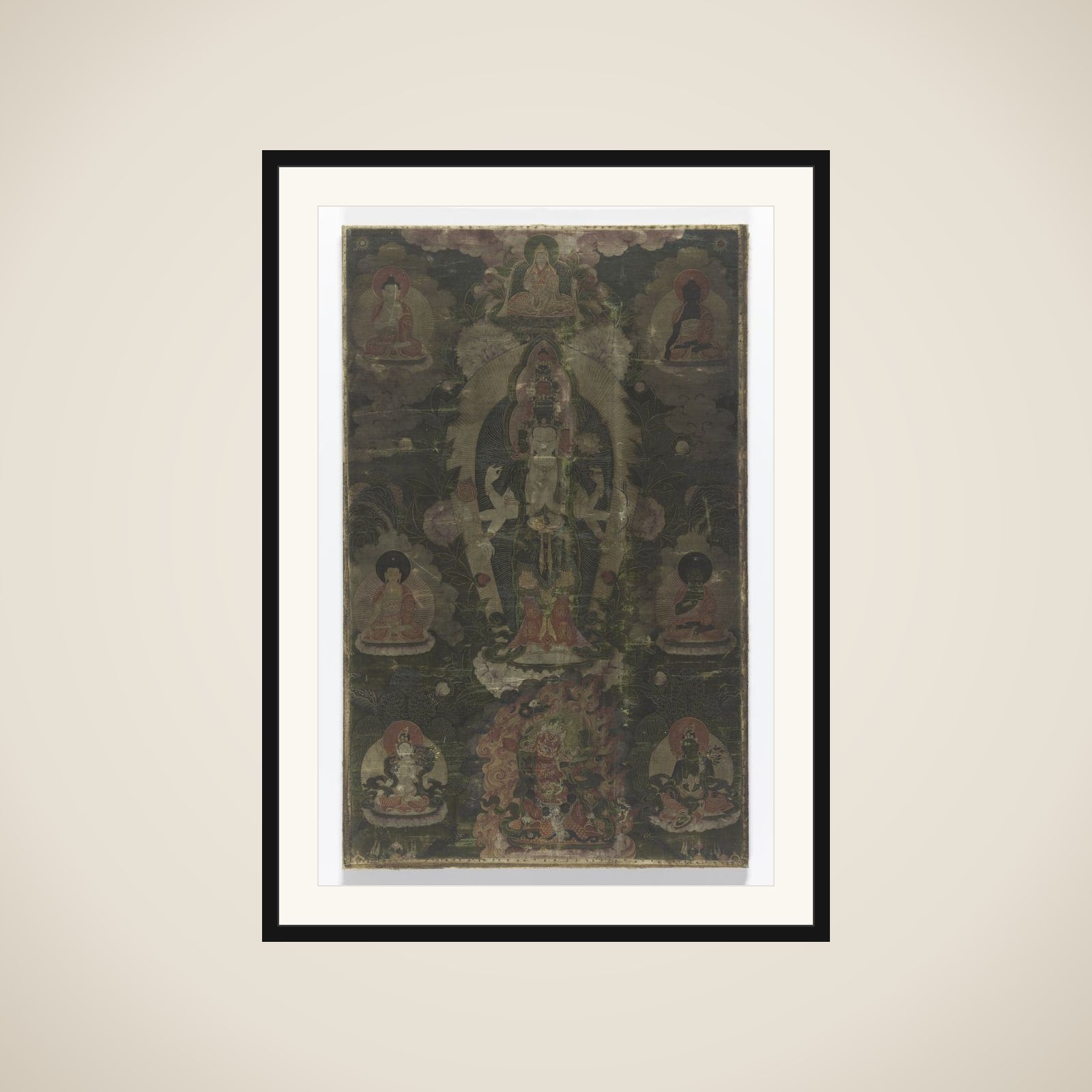 Tangka met een voorstelling van de Elfhoofdige Avalokiteshvara. framed