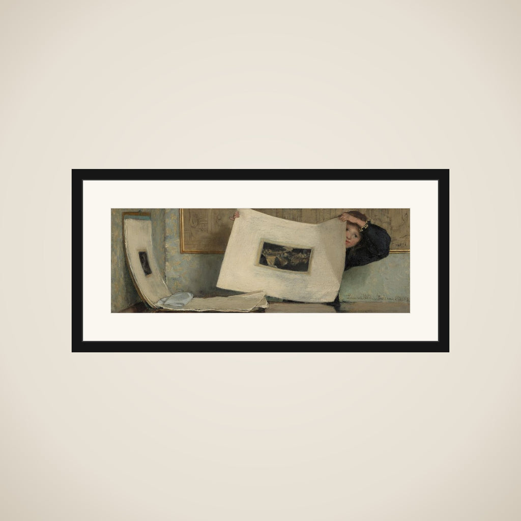 Anna Leafing Through a Portfolio of Prints framed