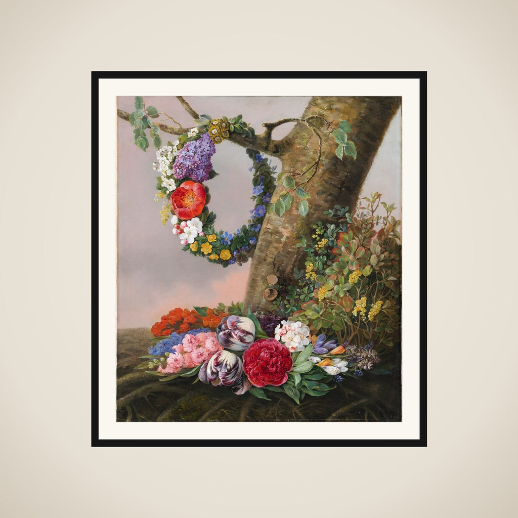 En buket blomster ved foden af et træ. På en gren hænger en blomsterkrans framed