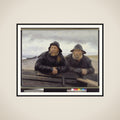 To fiskere ved en båd framed