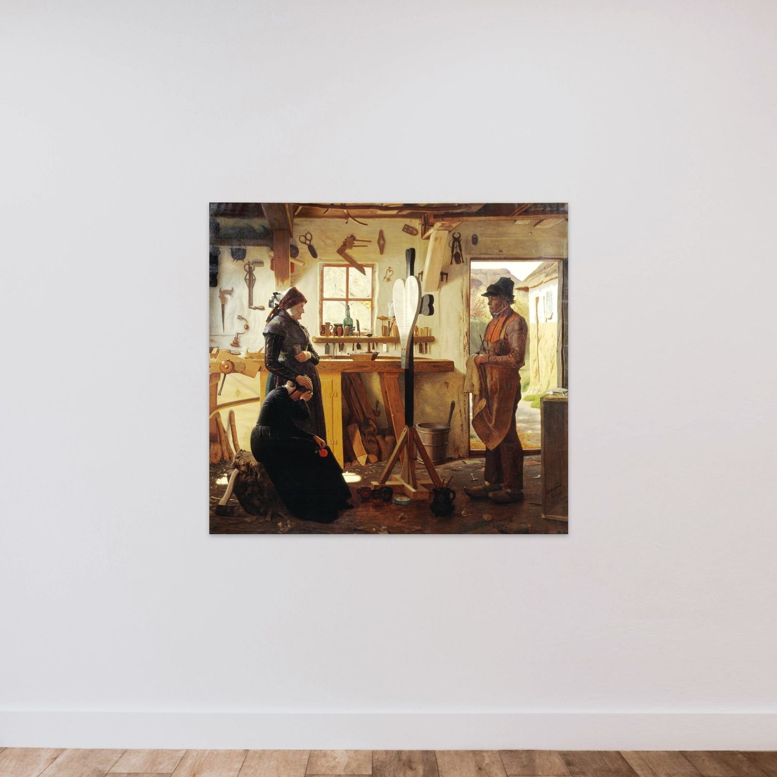 To kvinder besøger landsbykunstneren for at se det bestilte gravkors unframed — shown to scale