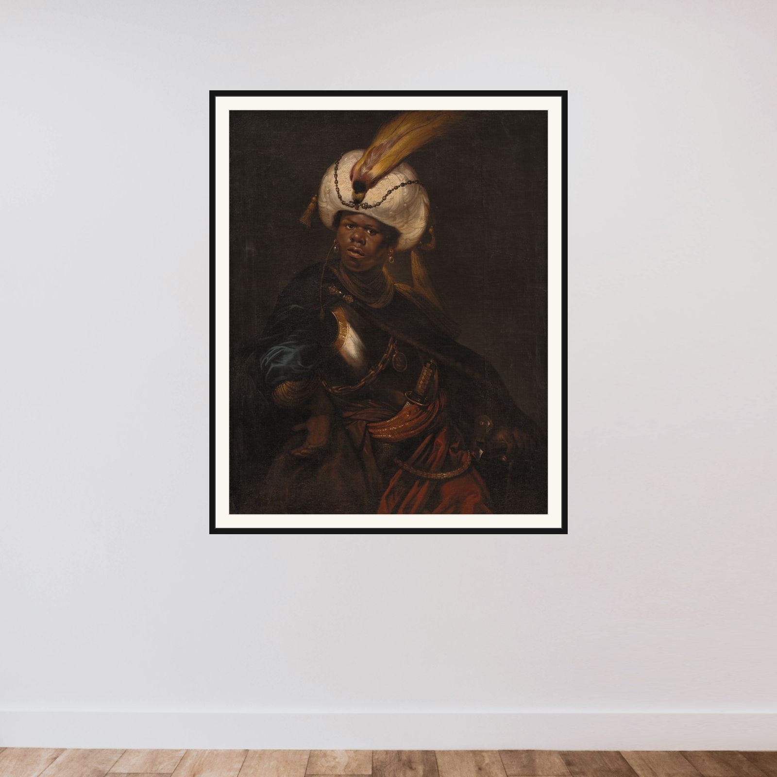 En mand med turban og rustning framed — shown to scale