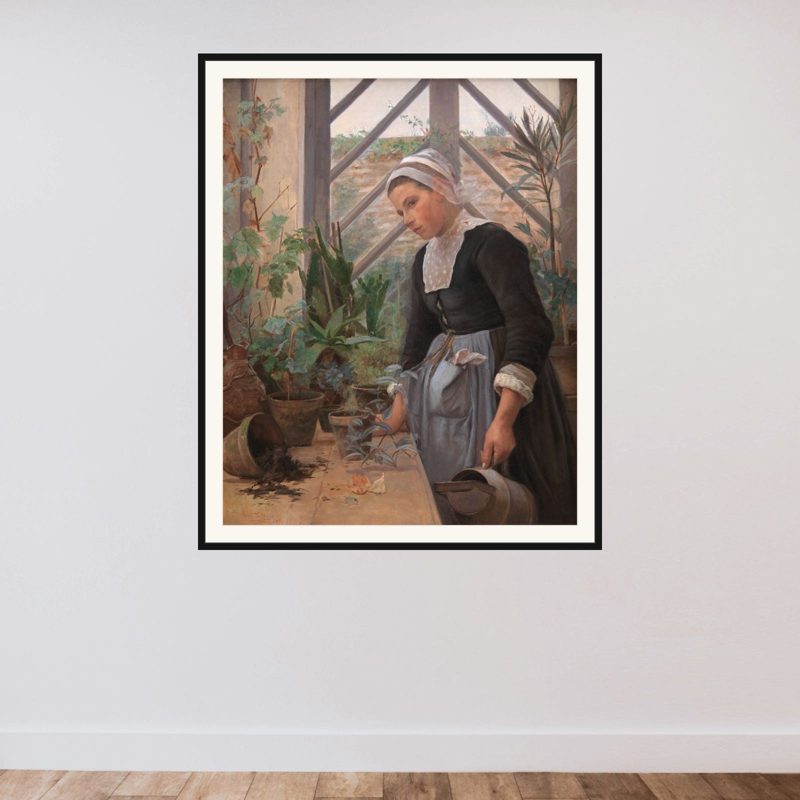 Bretagne-pige ordner planter i et drivhus framed — shown to scale