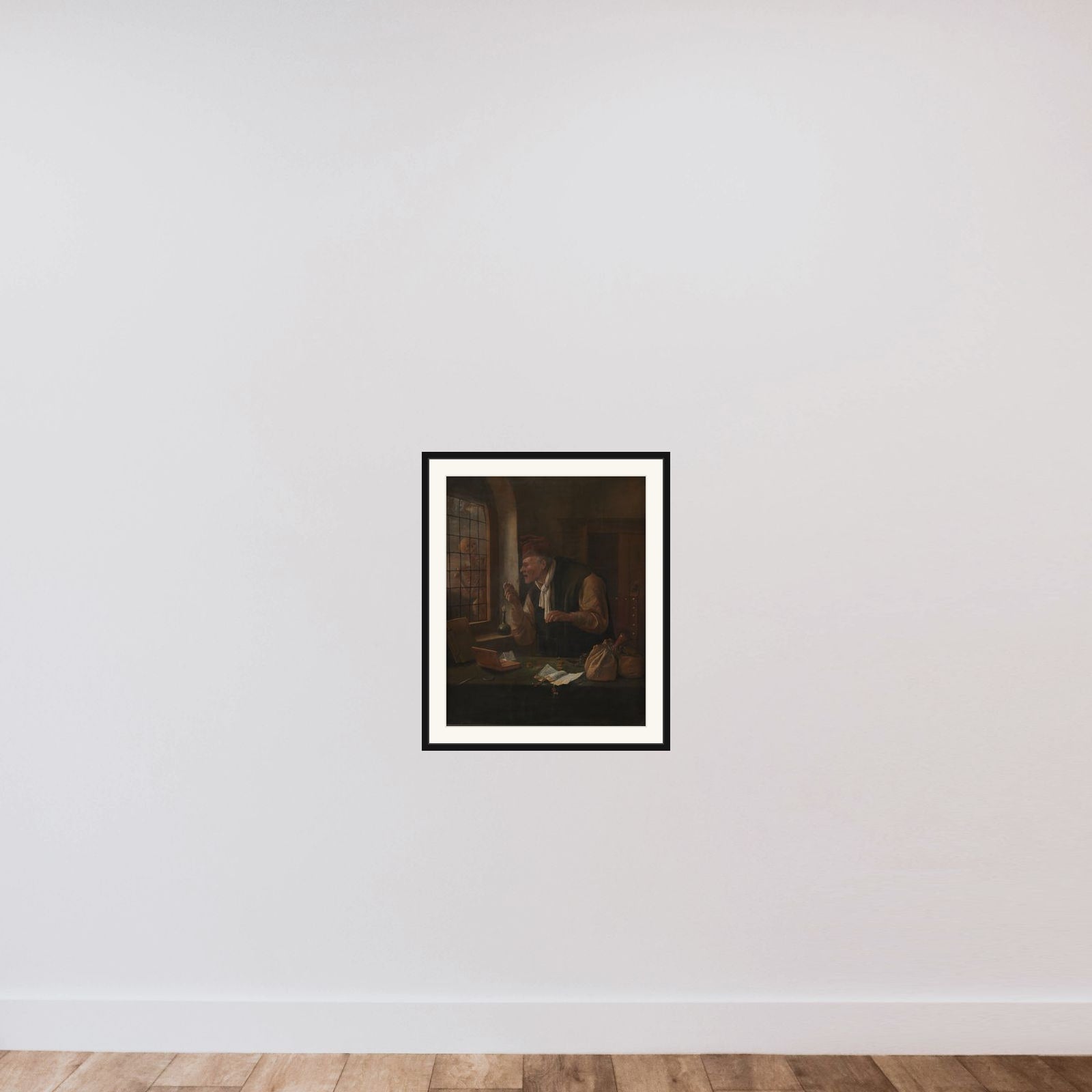 Den gerrige framed — shown to scale