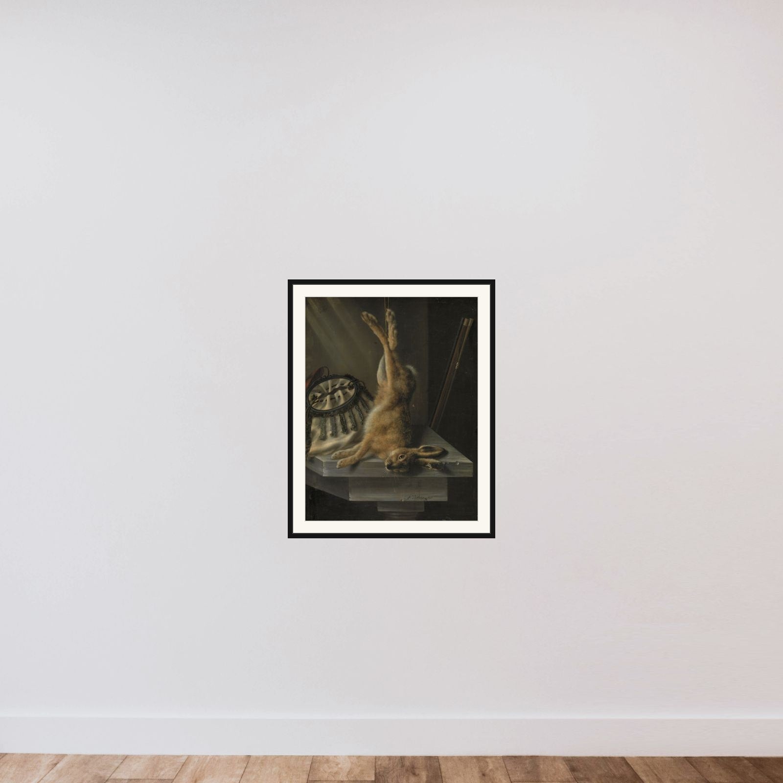 En død hare framed — shown to scale